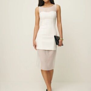 Never used reformation eydie dress. Dress was final sale and didn’t suit me